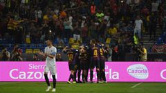 Barcelona&#039;s players celebrate their second goal during the Spanish Super Cup final between Sevilla FC and FC Barcelona at Ibn Batouta Stadium in the Moroccan city of Tangiers on August 12, 2018. (Photo by FADEL SENNA / AFP)