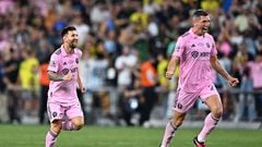 Inter Miami's Argentine forward #10 Lionel Messi and Inter Miami's Ukrainian defender #27 Sergii Kryvtsov celebrate after winning the the Leagues Cup final football match against Nashville SC at Geodis Park in Nashville, Tennessee, on August 19, 2023. (Photo by CHANDAN KHANNA / AFP)