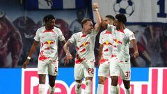 LEIPZIG, GERMANY - OCTOBER 15: David Raum of RB Leipzig celebrates with teammate Abdou Diallo after scoring their side's second goal during the Bundesliga match between RB Leipzig and Hertha BSC at Red Bull Arena on October 15, 2022 in Leipzig, Germany. (Photo by Maja Hitij/Getty Images)