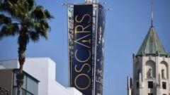 A sign announcing the upcoming Oscars Award show towers over Hollywood Boulevard, March 18, 2022, in Hollywood, California. - The 94th Academy Awards will take place on March 27, 2022 at the Dolby Theatre. (Photo by Robyn Beck / AFP)
