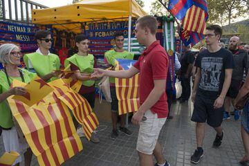Flags being handed out at the Camp Nou.