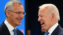 NATO Secretary General Jens Stoltenberg (L) and US President Joe Biden laugh at the start of the second plenary session of the NATO summit at the Ifema congress centre in Madrid, on June 29, 2022. (Photo by GABRIEL BOUYS / AFP) (Photo by GABRIEL BOUYS/AFP via Getty Images)