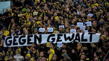 Supporters of Dortmund shows banners against violence following last weekends' scenes ahead of the match against Leipzig during the German Cup DFB Pokal round of 16 football match BVB Borussia Dortmund v Hertha Berlin
