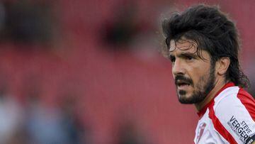 (FILES) This file photo taken on July 08, 2012 shows former Sion&#039;s player Gennaro Gattuso during a friendly football match between FC Sion and Olympique of Marseille. Fallen Italian giants AC Milan have sacked coach Vincenzo Montella and named combat