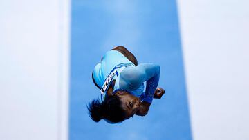 US' Simone Biles competes in the vault during the women's qualifying session at the 52nd FIG Artistic Gymnastics World Championships, in Antwerp, northern Belgium, on October 01, 2023. (Photo by Kenzo TRIBOUILLARD / AFP)