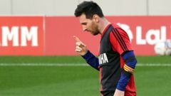 Barcelona&#039;s Argentinian forward Lionel Messi pays tribute for late Argentinian football legend Diego Maradona by revealing a Newell&#039;s Old Boys jersey after scoring his team&#039;s fourth goal during the Spanish League football match between FC B