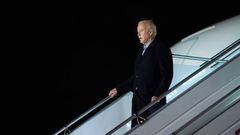 US President Joe Biden disembarks Air Force One at a military airport in Warsaw, Poland, on February 20, 2023.