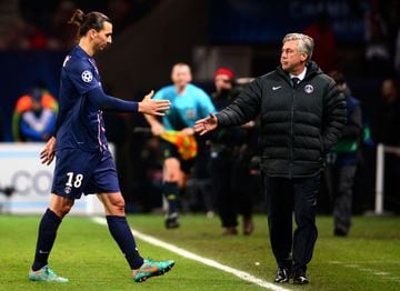 PSG's Swedish forward Zlatan Ibrahimovic (L) shakes hands with PSG's coach Carlo Ancelotti at the end of the UEFA Champions League Group A match PSG and Dinamo Zagreb on November 6, 2012 at the Parc des Princes stadium in Paris. 