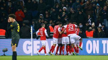 Reims' players celebrate after scoring their first goal during the French L1 football match between Paris Saint-Germain (PSG) and Stade de Reims at the Parc des Princes stadium in Paris on January 29, 2023. (Photo by Geoffroy VAN DER HASSELT / AFP) (Photo by GEOFFROY VAN DER HASSELT/AFP via Getty Images)