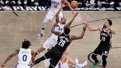 The 76ers' De'ÄôAnthony Melton (2-L) and Tyrese Maxey (L) fight for a loose ball with the Nets' Spencer Dinwiddie (R) and Dorian Finney-Smith (2-R) during the fourth quarter of game three of the first round playoff series between the Philadelphia 76ers and the Brooklyn Nets at the Barclays Center in the Brooklyn borough of New York, New York, USA, 20 April 2023.
