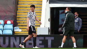 BIRMINGHAM, ENGLAND - MAY 09: Harry Maguire of Manchester United reacts as he leaves the pitch following an injury during the Premier League match between Aston Villa and Manchester United at Villa Park on May 09, 2021 in Birmingham, England. Sporting sta