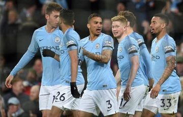 Manchester City's Belgian midfielder Kevin De Bruyne (3R) celebrates scoring the opening goal during the English Premier League football match between Manchester City and Cardiff City at the Etihad Stadium in Manchester, north west England, on April 3, 20