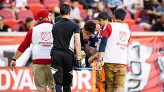 HARRISON, NJ - AUGUST 13: Alexandre Pato #7 of Orlando City SC reacts to being taken off in a stretcher in the first half of the Major League Soccer match against New York Red Bulls at Red Bull Arena on August 13, 2022 in Harrison, New Jersey. (Photo by Ira L. Black - Corbis/Getty Images)