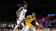 Apr 28, 2023; Los Angeles, California, USA; Los Angeles Lakers guard D'Angelo Russell (1) dribbles against Memphis Grizzlies guard Ja Morant (12) in the first quarter of game six of the 2023 NBA playoffs at Crypto.com Arena. Mandatory Credit: Jayne Kamin-Oncea-USA TODAY Sports