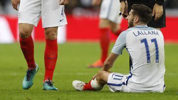 England&#039;s Adam Lallana lies injured