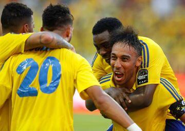 Gabon's Pierre-Emerick Aubameyang celebrates scoring a goal with Malick Evouna.