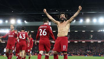 Mohammed Salah sets new Liverpool record as Reds inflict historic rout on Premier League hopefuls Manchester United.