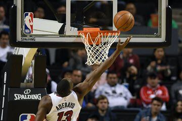 Miami Heat's Bam Adebayo dunks against Brooklyn Nets, during their NBA Global Games match at the Mexico City Arena, on December 9, 2017, in Mexico City. / AFP PHOTO / PEDRO PARDO
