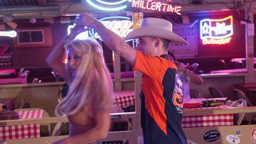 AUSTIN, TX - APRIL 20:  Pol Espargaro  of Spain and Red Bull KTM Factory Racing dances with a girl  during the pre-event &quot;Riders have a private and exciting dance lesson in Broken Spoke Dance Hall in Austin&quot; during the MotoGp Red Bull U.S. Grand Prix of The Americas - Previews at Circuit of The Americas on April 20, 2017 in Austin, Texas.  (Photo by Mirco Lazzari gp/Bongarts/Getty Images)