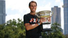Spain&#039;s Rafael Nadal poses with the winner&#039;s trophy during a media photo shoot the morning after his victory in the men&#039;s singles final at the Australian Open tennis tournament in Melbourne on January 31, 2022. (Photo by Martin KEEP / AFP) 