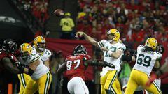 Oct 30, 2016; Atlanta, GA, USA; Green Bay Packers quarterback Aaron Rodgers (12) makes a pass against the rush of Atlanta Falcons defensive tackle Grady Jarrett (97) in the first quarter of their game at the Georgia Dome. Mandatory Credit: Jason Getz-USA TODAY Sports