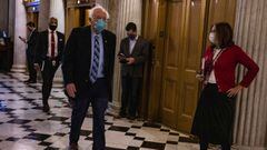 Congress has passed a $900 billion coronavirus relief bill but figures from President Trump to Bernie Sanders were calling for larger direct payment.