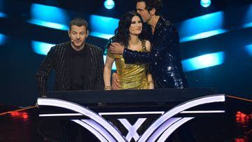 TURIN, ITALY - MAY 14: Alessandro Cattelan, Laura Pausini and Mika are seen on stage during the Grand Final show of the 66th Eurovision Song Contest at Pala Alpitour on May 14, 2022 in Turin, Italy. (Photo by Giorgio Perottino/Getty Images)
