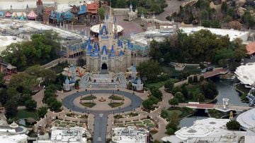 FILE PHOTO: Cinderella Castle is seen at the end of an empty Main Street at Disney&#039;s Magic Kingdom theme park after it closed in an effort to combat the spread of coronavirus disease (COVID-19), in an aerial view in Orlando, Florida, U.S. March 16, 2