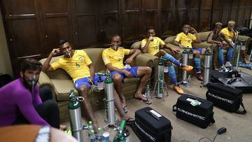 The Brazilian boys take in some oxygen after the game in Bolivia.