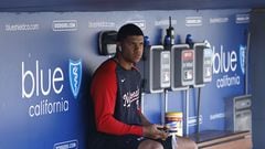 LOS ANGELES, CALIFORNIA - JULY 27: Juan Soto #22 of the Washington Nationals talks on the phone in the dugout prior to a game against the Los Angeles Dodgers at Dodger Stadium on July 27, 2022 in Los Angeles, California.   Michael Owens/Getty Images/AFP
== FOR NEWSPAPERS, INTERNET, TELCOS & TELEVISION USE ONLY ==