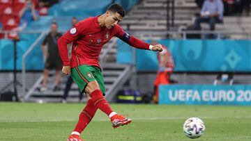 BUDAPEST, HUNGARY - JUNE 23: Cristiano Ronaldo of Portugal scores their side&#039;s first goal from the penalty spot during the UEFA Euro 2020 Championship Group F match between Portugal and France at Puskas Arena on June 23, 2021 in Budapest, Hungary. (Photo by Alex Pantling/Getty Images)