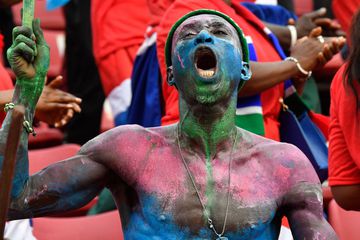 A Gammbia's supporter reacts during the Group F Africa Cup of Nations (CAN) 2021 football match between Mauritania and Gambia at Limbe Omnisport Stadium in Limbe on January 12, 2022. (Photo by Issouf SANOGO / AFP)