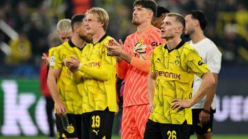 Neither team shone as Dortmund played out a tight draw against AC Milan which keeps Group F alive.