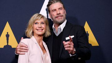 FILE PHOTO: Cast members John Travolta and Olivia Newton-John pose at a 40th anniversary screening of "Grease" at the Academy of Motion Picture Arts and Sciences in Beverly Hills, California, U.S., August 15, 2018. REUTERS/Mario Anzuoni/File Photo