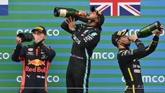 Formula One F1 - Eifel Grand Prix - Nurburgring, Nurburg, Germany - October 11, 2020 Mercedes&#039; Lewis Hamilton celebrates with sparkling wine on the podium after winning the race alongside second placed Red Bull&#039;s Max Verstappen and third placed 