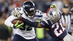 Nov 13, 2016; Foxborough, MA, USA;  Seattle Seahawks running back Christine Michael (32) is tackled by New England Patriots cornerback Malcolm Butler (21) during the fourth quarter at Gillette Stadium.  The Seattle Seahawks won 31-24.  Mandatory Credit: Greg M. Cooper-USA TODAY Sports
