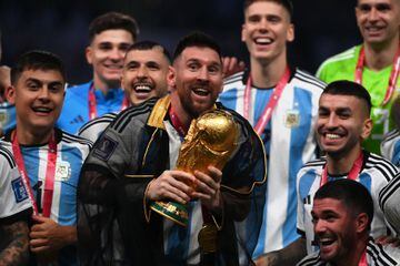 Argentina forward Lionel Messi lifts the World Cup trophy.