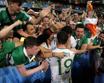 Robbie Brady celebrates with Ireland fans after their win over Italy
