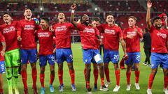DOHA, QATAR - JUNE 14: Costa Rica players celebrate victory after the 2022 FIFA World Cup Playoff match between Costa Rica and New Zealand at Ahmad Bin Ali Stadium on June 14, 2022 in Doha, Qatar.