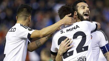 Álvaro Negredo celebrates with man-of-the-match Santi Mina