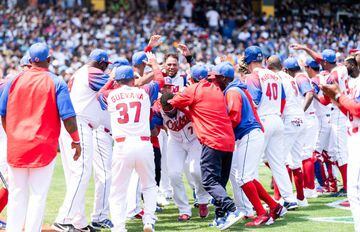 Team Cuba react after Erisbel Arruebarrena #71 of Team Cuba hit a 2 run homerun at the bottom of the 1st inning during the World Baseball Classic Pool A game between Chinese Taipei and Cuba at Taichung Intercontinental Baseball Stadium on March 12, 2023 in Taichung, Taiwan.