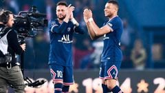 Kylian Mbappé and Neymar applaud PSG fans after Mauricio Pochettino's side wrapped up the title against Lens at Parc des Princes.