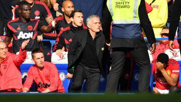 Soccer Football - Premier League - Chelsea v Manchester United - Stamford Bridge, London, Britain - October 20, 2018  Manchester United manager Jose Mourinho reacts to Chelsea assistant coach Marco Ianni after Chelsea&#039;s second goal  REUTERS/Dylan Mar