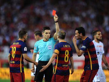 Iniesta can't change the ref's mind.
