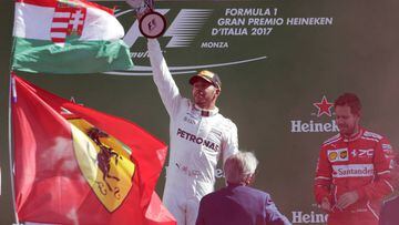Hamilton cruises to victory and top of drivers' championship