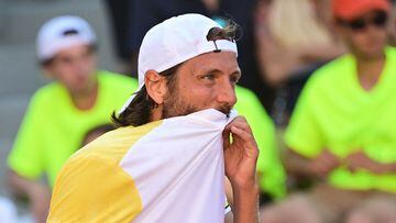 France's Lucas Pouille reacts during his match against Britain's Cameron Norrie during their men's singles match on day four of the Roland-Garros Open tennis tournament at the Court Suzanne-Lenglen in Paris on May 31, 2023. (Photo by Emmanuel DUNAND / AFP)
