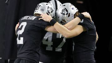 LAS VEGAS, NEVADA - JANUARY 09: Kicker Daniel Carlson #2, long snapper Trent Sieg #47 and punter A.J. Cole #6 of the Las Vegas Raiders get ready to take the field for their game against the Los Angeles Chargers at Allegiant Stadium on January 9, 2022 in L