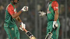 Bangladesh cricket captain Mashrafe Bin Mortaza (left) celebrates with his team-mate Mohammad Mahmudullah (right) during their side&#039;s Asia Cup T20 cricket tournament match against Pakistan.