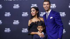 Real Madrid's Cristiano Ronaldo, his son Cristiano Ronaldo Jr and Georgina Rodriguez arrive at the ceremony.