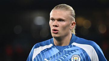 Manchester City's Norwegian striker #09 Erling Haaland reacts as he warms up prior to the UEFA Champions League Group G football match between Manchester City and FC Crvena Zvezda (Red Star Belgrade) at the Etihad Stadium in Manchester, north west England, on September 19, 2023. (Photo by Oli SCARFF / AFP)
